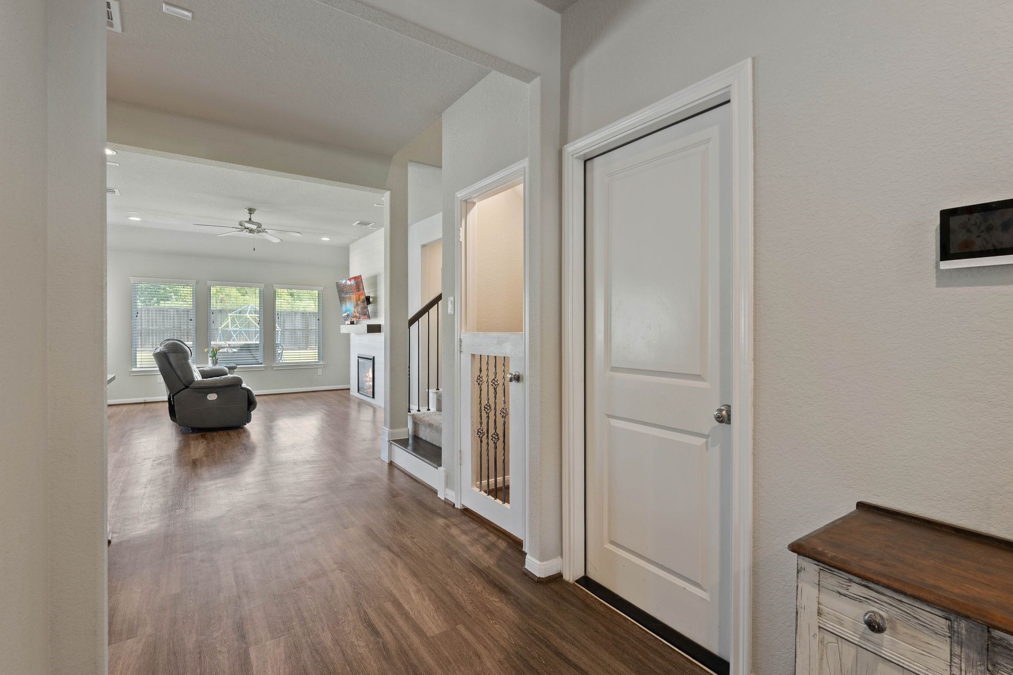 2328 Hagerman Road Conroe, TX 77384 - Photo 12 of 45 a living room with furniture and a wooden floor
