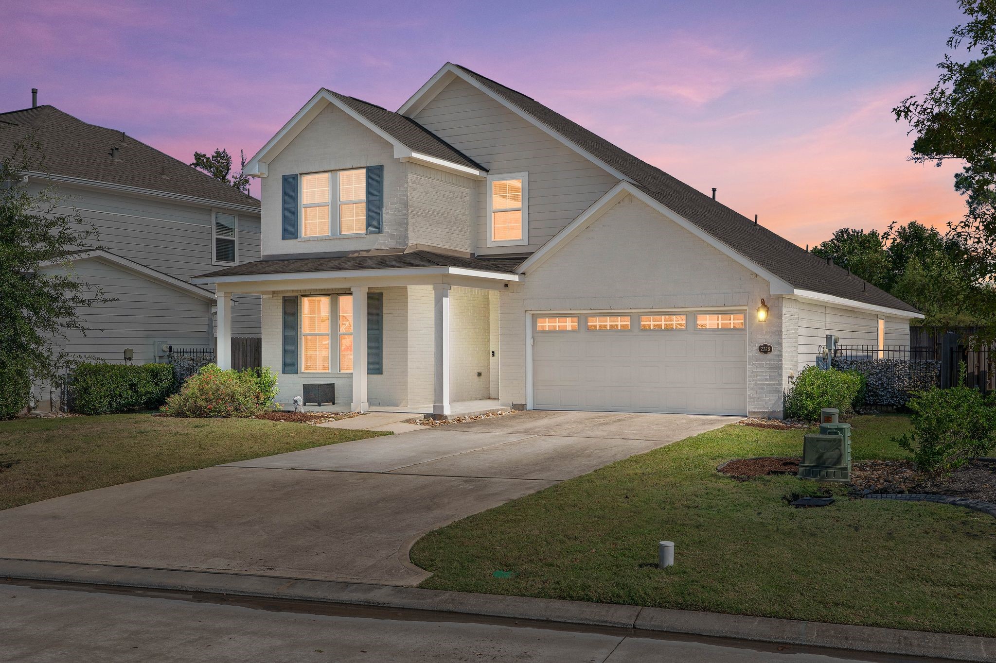 2328 Hagerman Road Conroe, TX 77384 - Photo 3 of 45 a front view of a house with garden