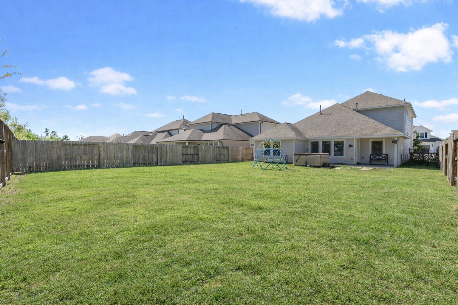 2328 Hagerman Road Conroe, TX 77384 - Photo 37 of 45 a view of a house with a yard