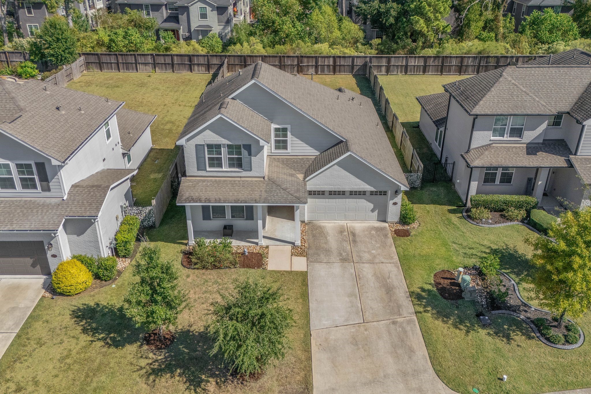 2328 Hagerman Road Conroe, TX 77384 - Photo 40 of 45 an aerial view of a house with a garden view
