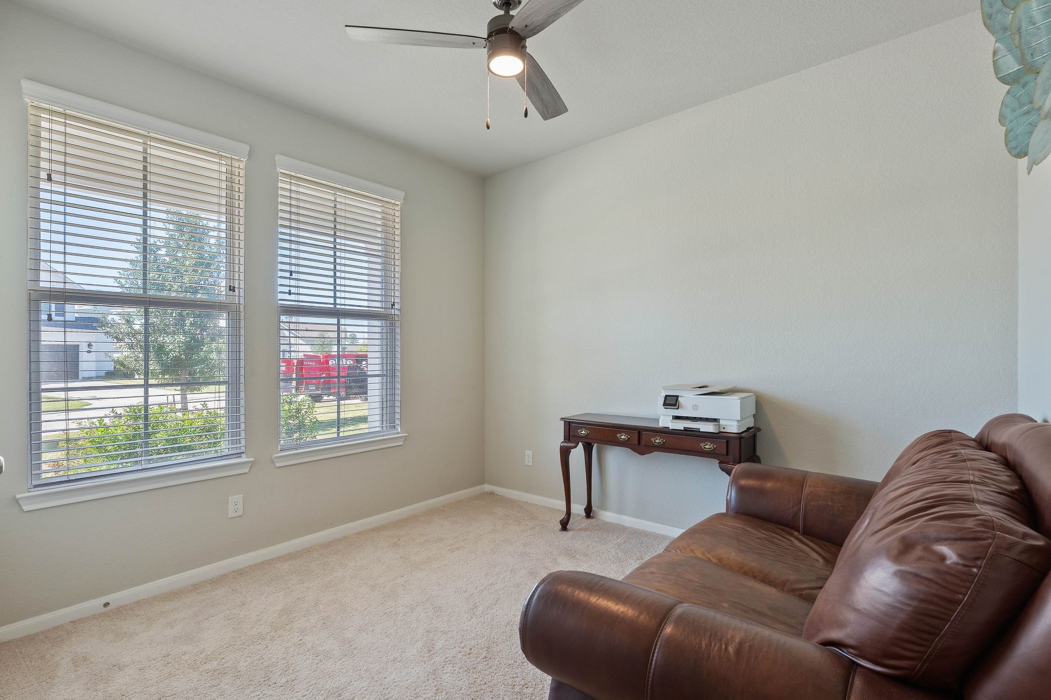 2328 Hagerman Road Conroe, TX 77384 - Photo 10 of 45 a living room with furniture and a window