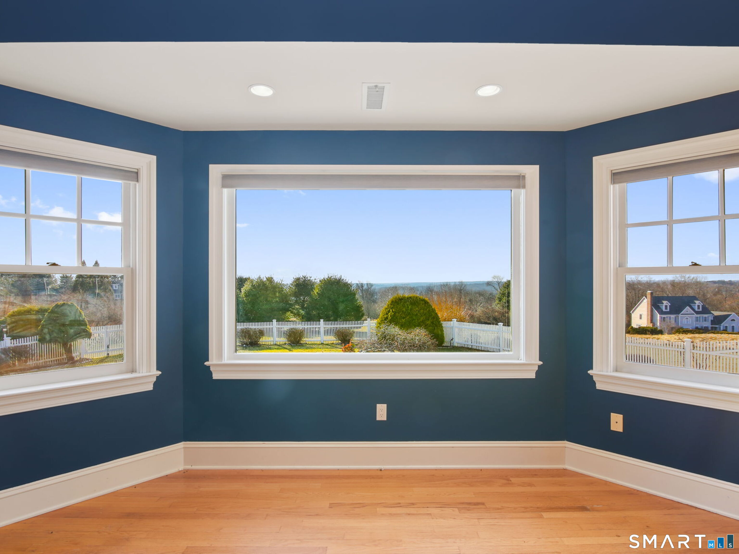 7 Long Meadow Lane Redding, CT 06896 - Photo 22 of 38 a view of an empty room with a window