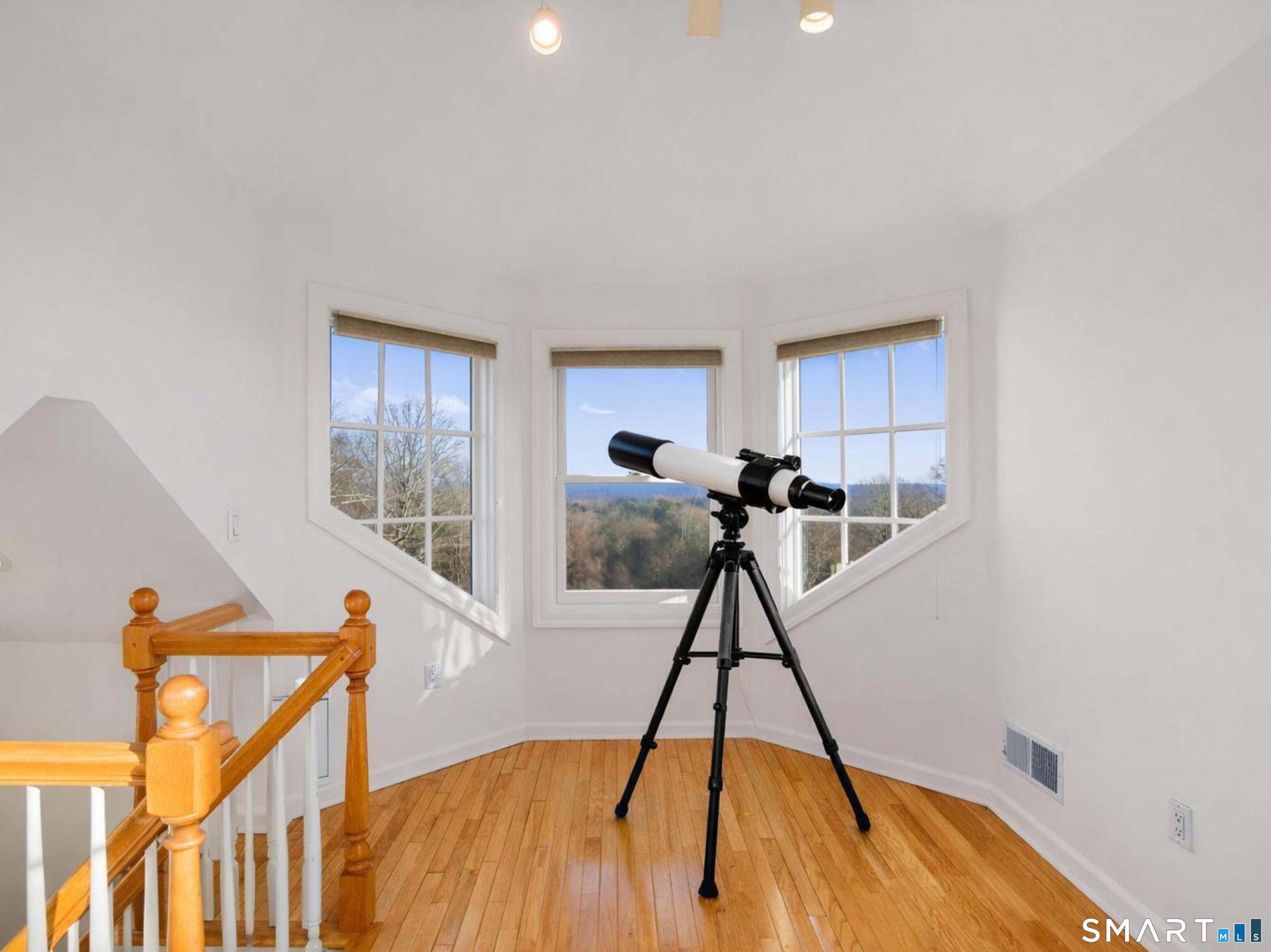 7 Long Meadow Lane Redding, CT 06896 - Photo 3 of 38 Lookout Alcove -High above the home, this light-filled lookout captures sweeping views and offers a perfect spot for stargazing