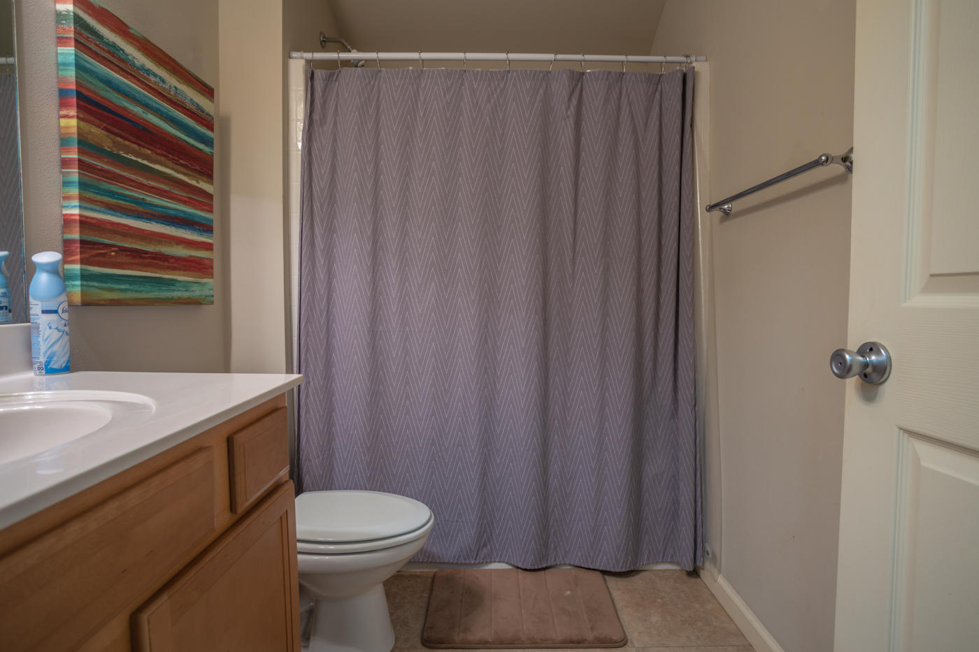 40 Myrtle Oak Way Santa Rosa Beach, FL 32459 - Photo 23 of 42 a bathroom with a sink a toilet and shower curtain