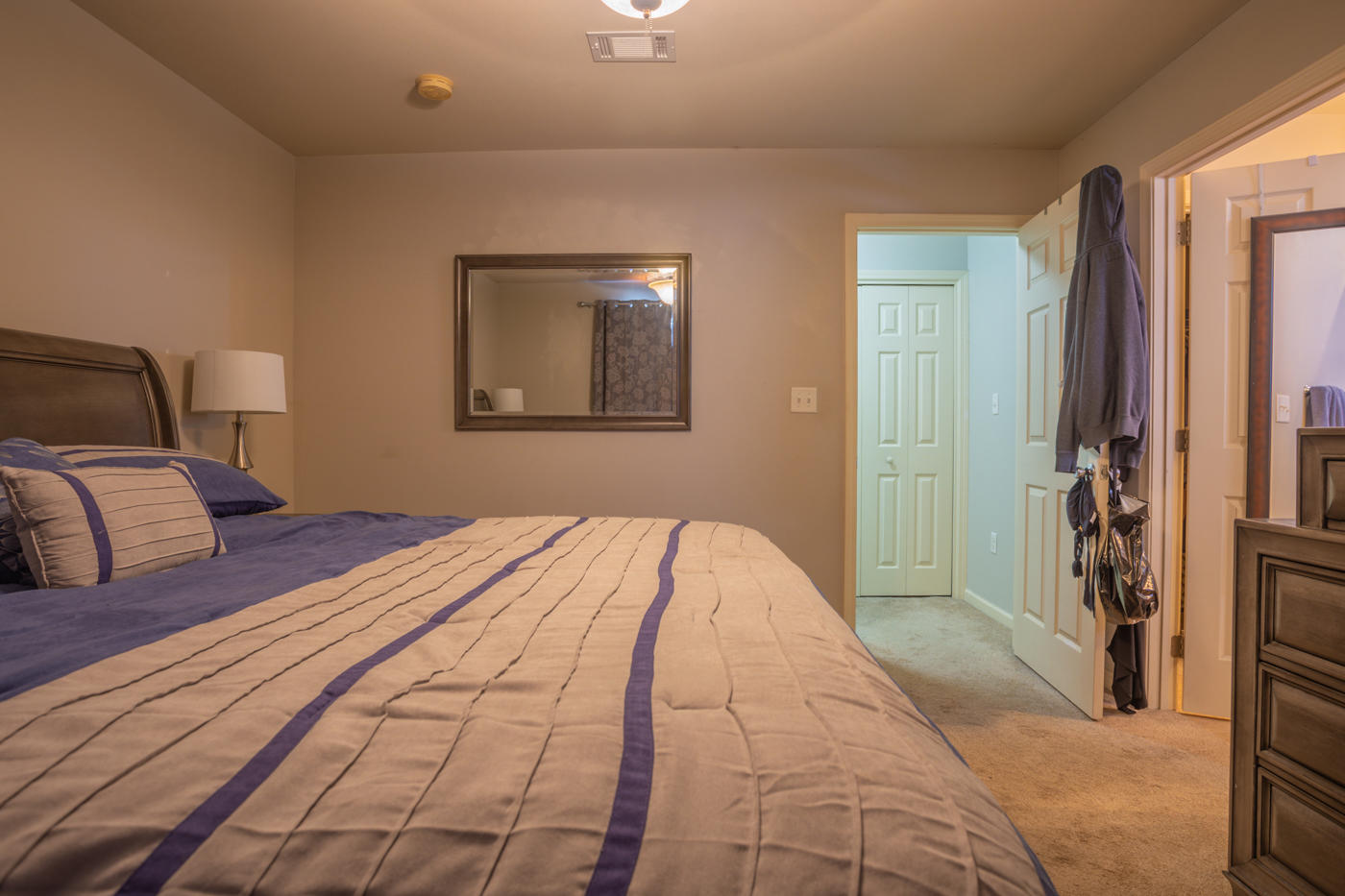 40 Myrtle Oak Way Santa Rosa Beach, FL 32459 - Photo 36 of 42 a bedroom with a bed and a mirror