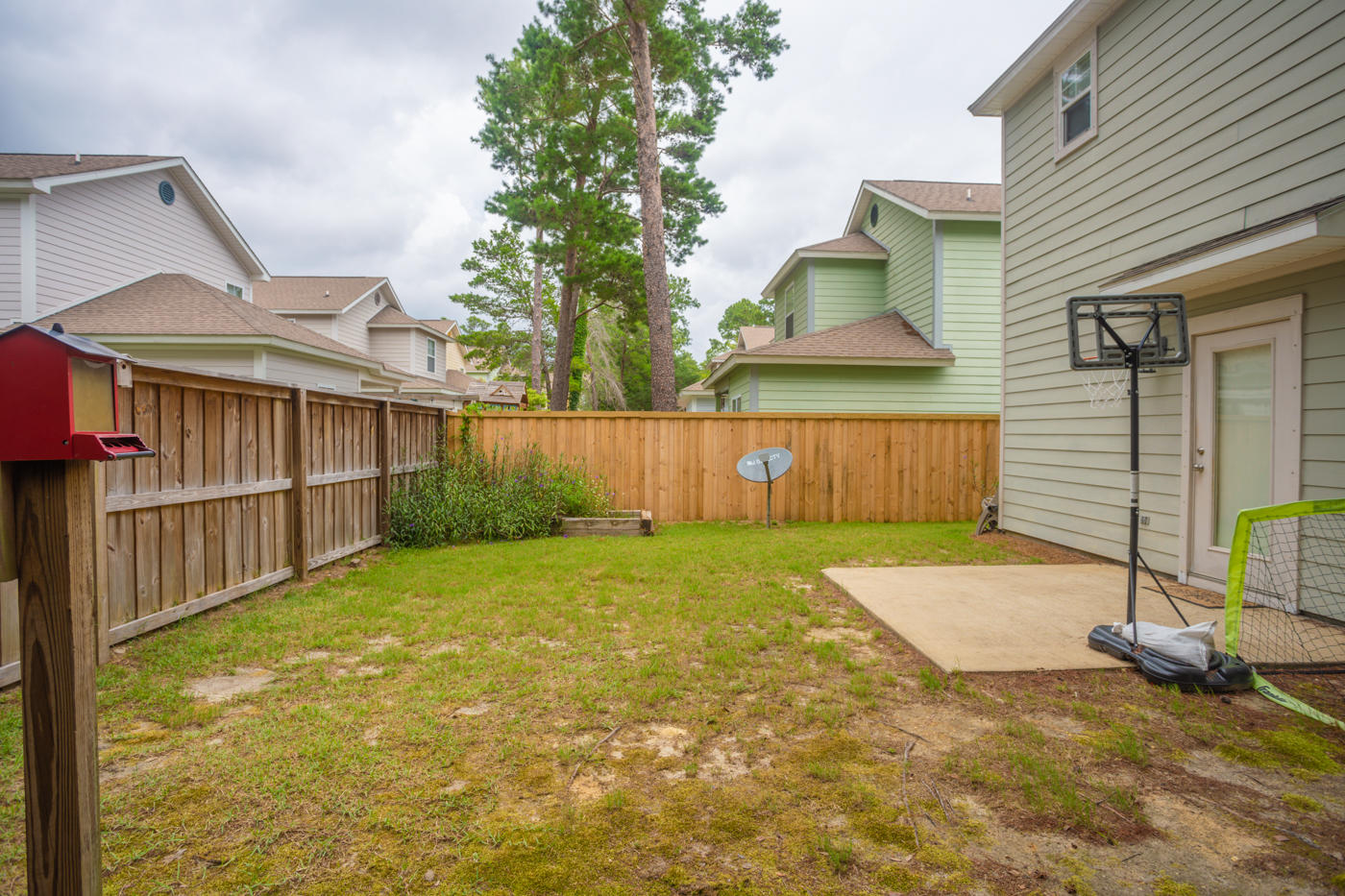 40 Myrtle Oak Way Santa Rosa Beach, FL 32459 - Photo 40 of 42 a view of a backyard with wooden fence