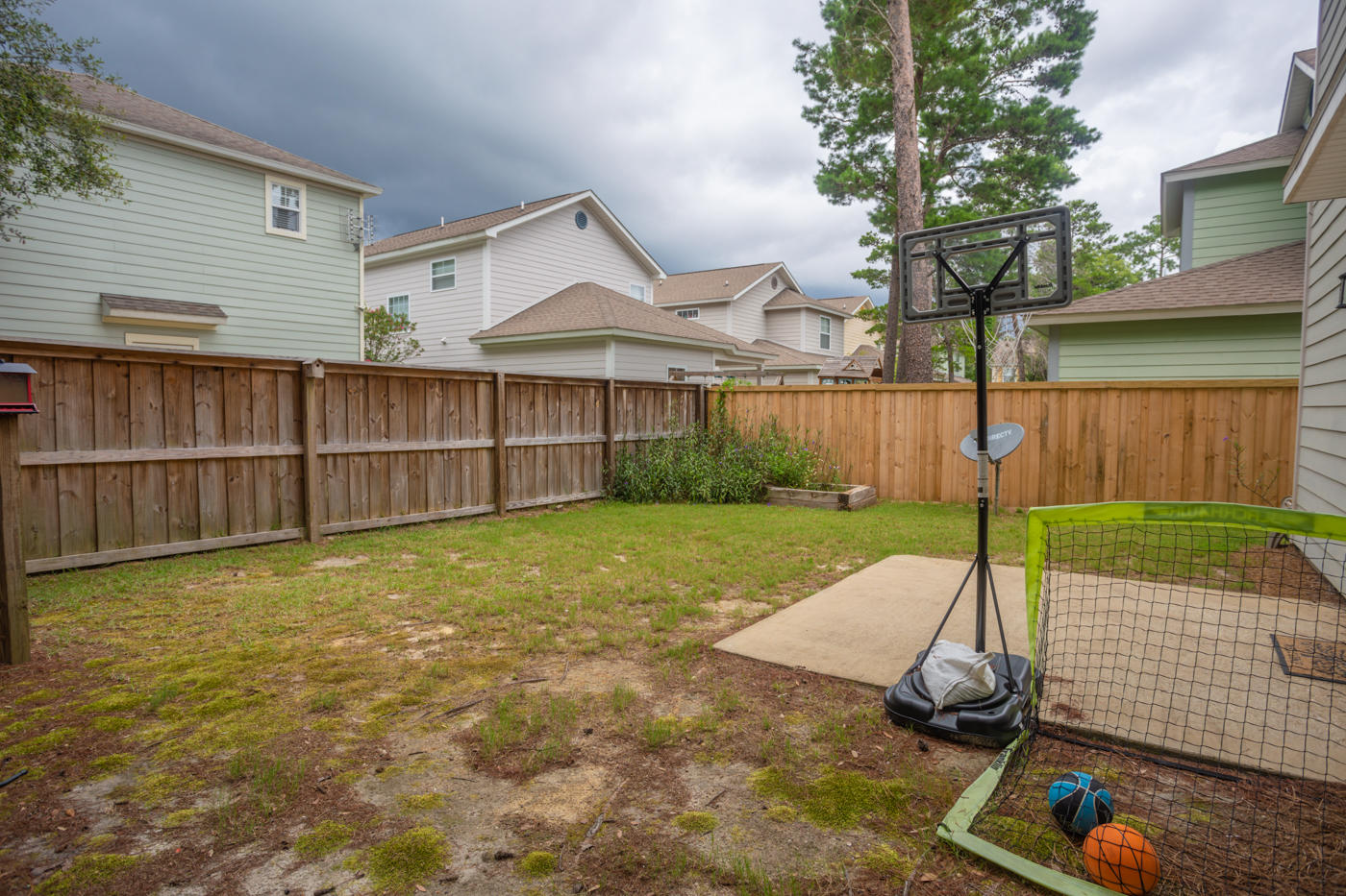 40 Myrtle Oak Way Santa Rosa Beach, FL 32459 - Photo 41 of 42 a view of a backyard with a tv