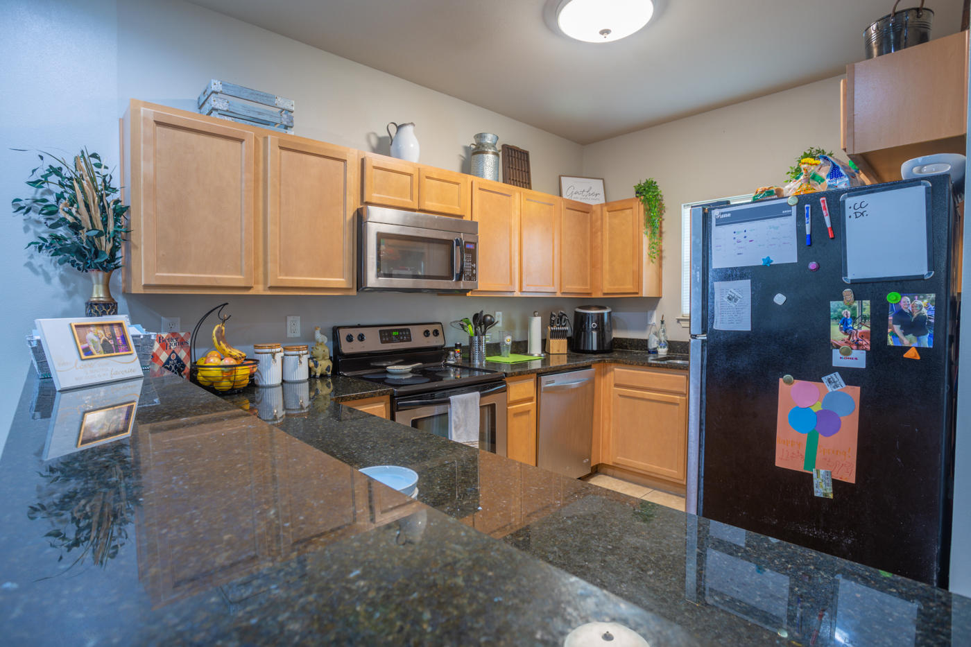 40 Myrtle Oak Way Santa Rosa Beach, FL 32459 - Photo 7 of 42 a kitchen with stainless steel appliances a stove a sink and a refrigerator