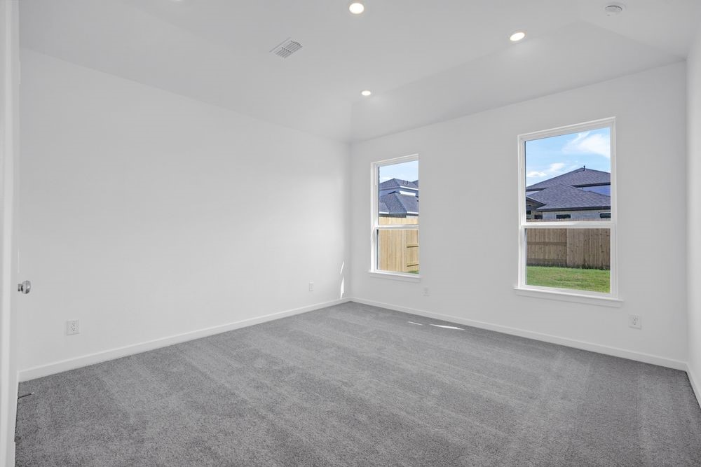 22122 Strathfield Circle Cypress, TX 77433 - Photo 11 of 38 an empty room with windows