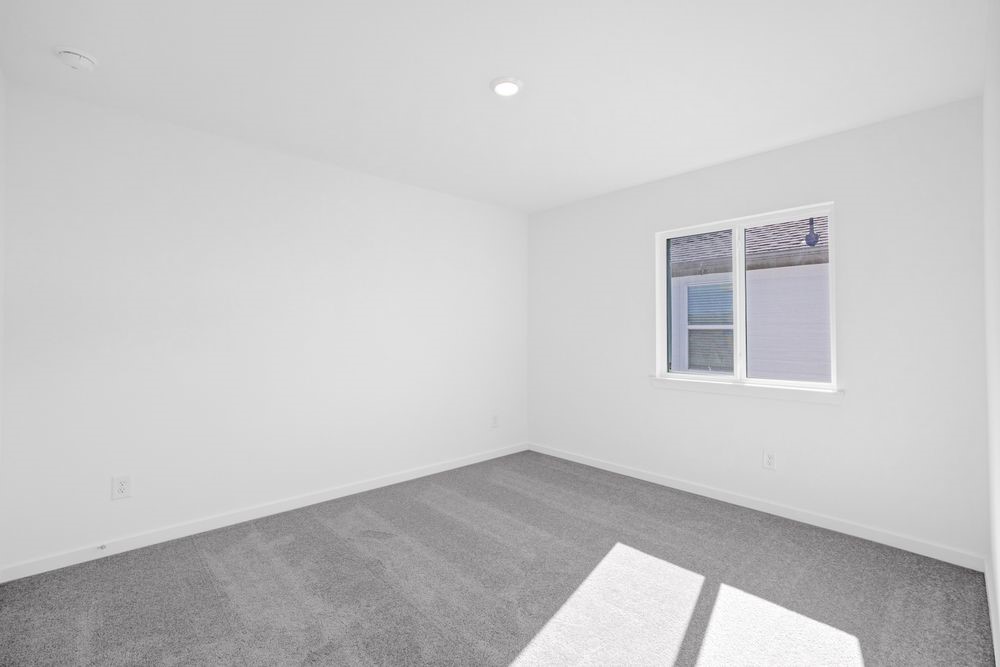 22122 Strathfield Circle Cypress, TX 77433 - Photo 15 of 38 an empty room with a window