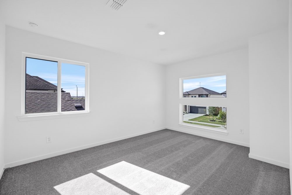 22122 Strathfield Circle Cypress, TX 77433 - Photo 16 of 38 a view of an empty room with a window