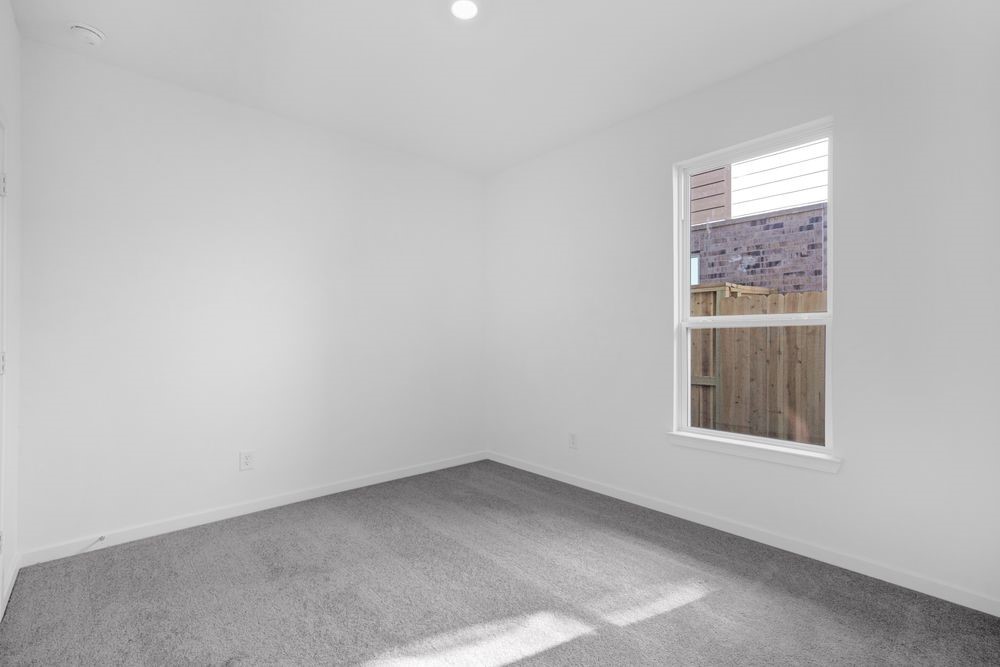 22122 Strathfield Circle Cypress, TX 77433 - Photo 17 of 38 an empty room with a window