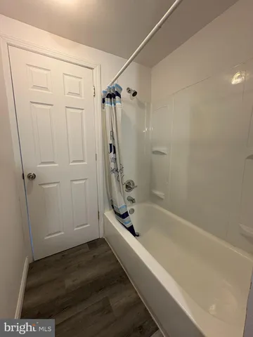 a bathroom with a bathtub