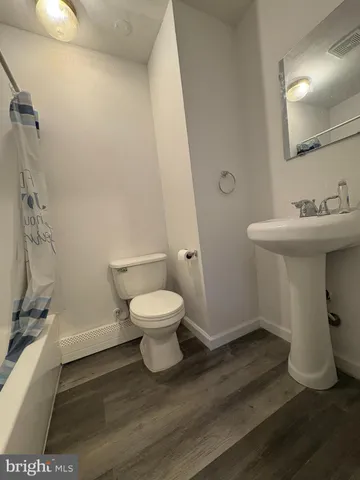 a bathroom with a sink and a toilet