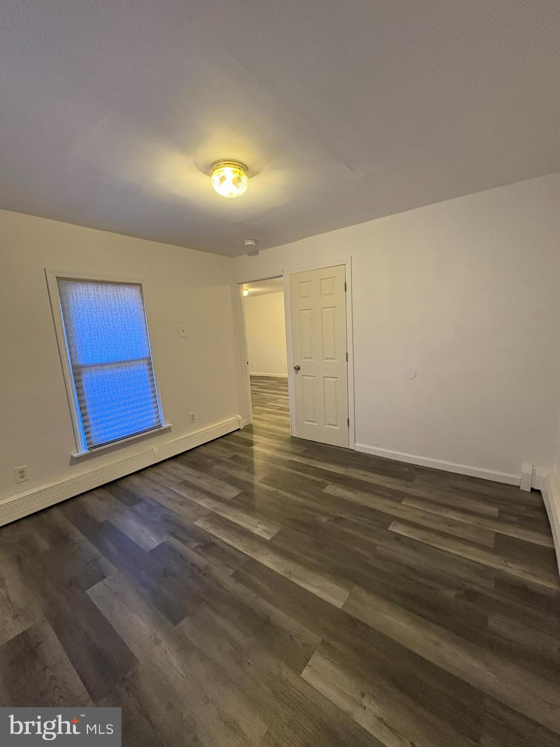 38 Broadway, Unit D Laurel Springs, NJ 08021 - Photo 9 of 21 a view of a room with wooden floor