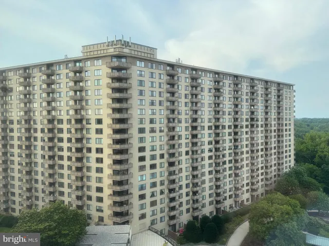 a bathroom with a shower curtain