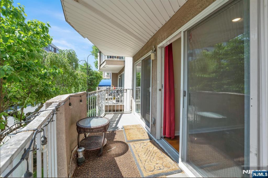 105 State Street, Unit 1B Hackensack, NJ 07601 - Photo 20 of 22 a balcony view with a seating space