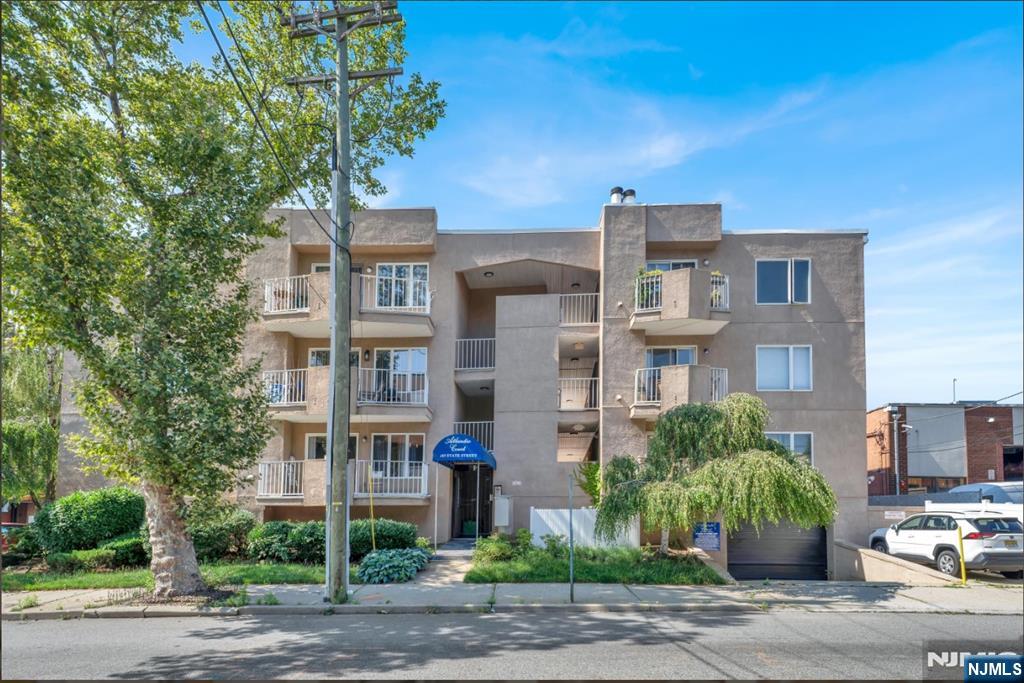 105 State Street, Unit 1B Hackensack, NJ 07601 - Photo 2 of 22 a front view of a building