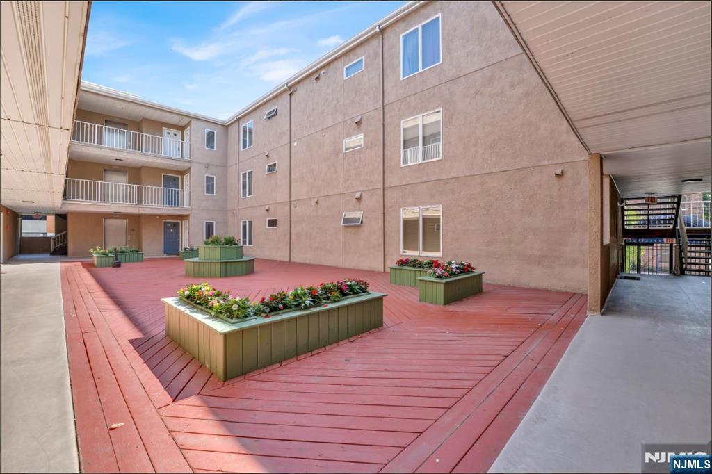 105 State Street, Unit 1B Hackensack, NJ 07601 - Photo 8 of 22 a view of an chairs and tables in the room