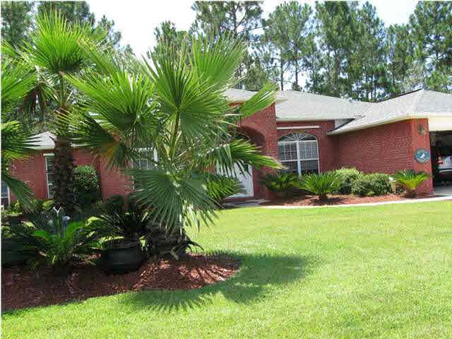 Front on Home with 2 Car Garage.