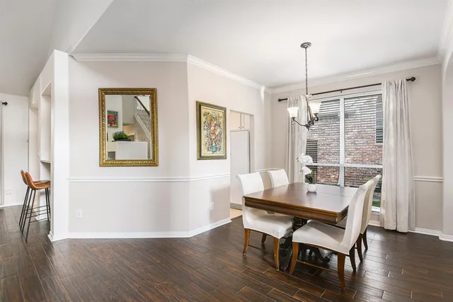 a dining room with furniture window wooden floor