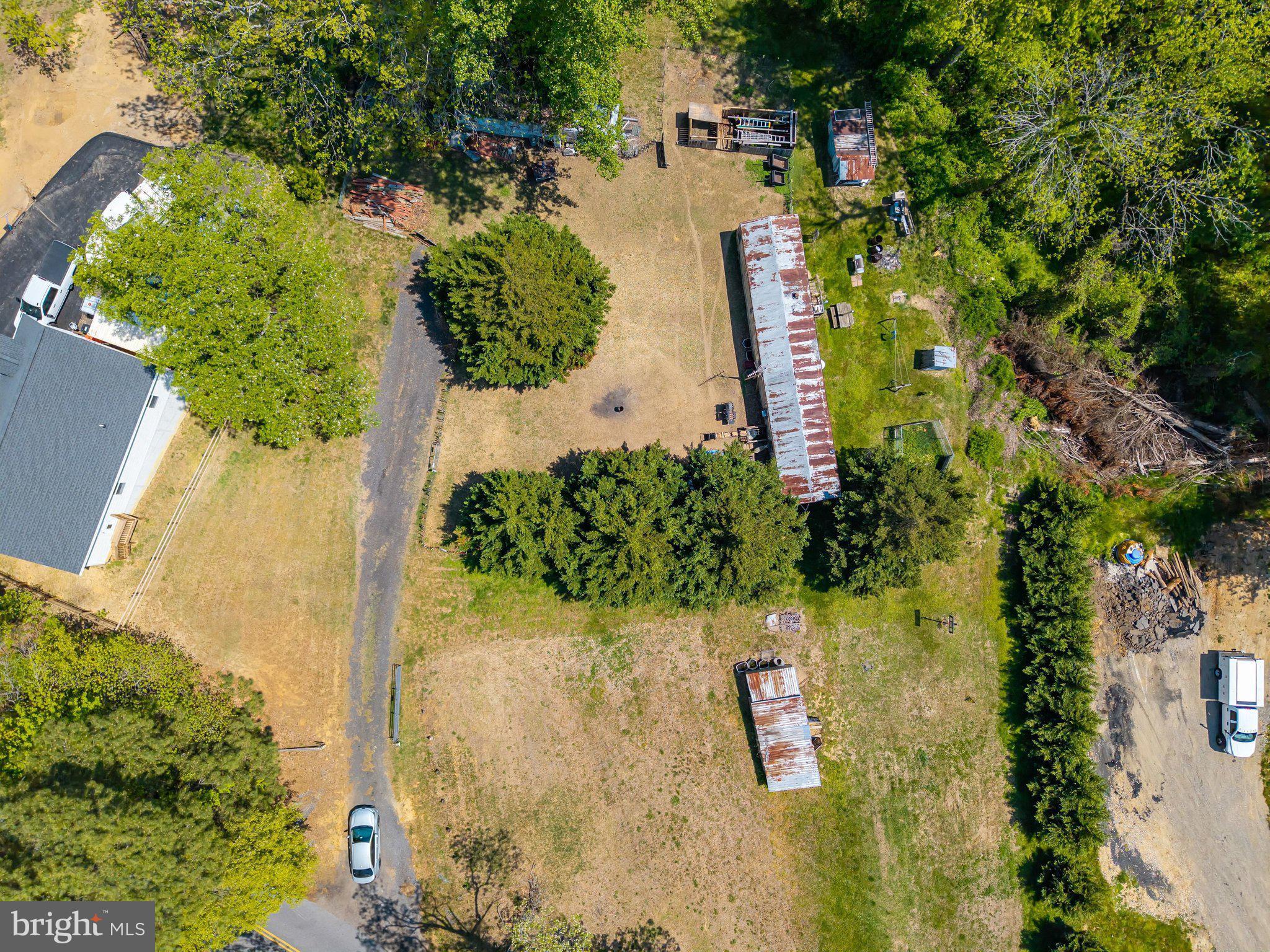 735 Claggett Road Sunderland, MD 20689 - Photo 6 of 11 an aerial view of a residential houses with yard