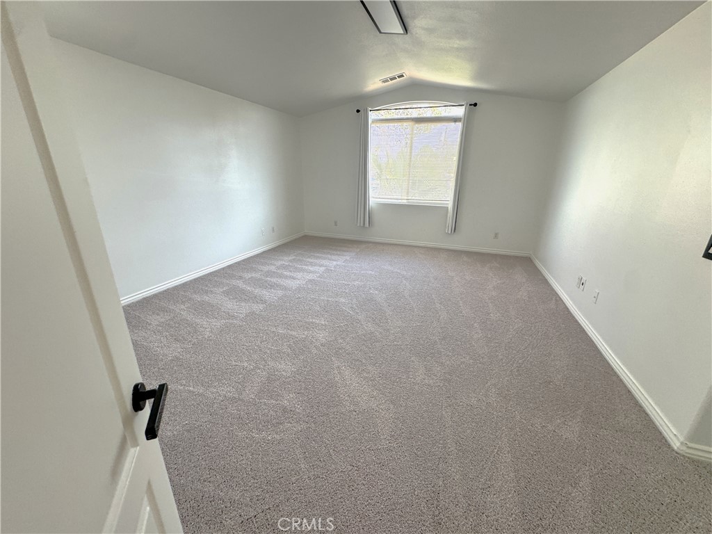 8240 Chamberlain Lane Reseda, CA 91335 - Photo 15 of 23 an empty room with windows