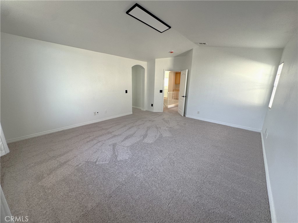 8240 Chamberlain Lane Reseda, CA 91335 - Photo 16 of 23 an empty room with windows and closet