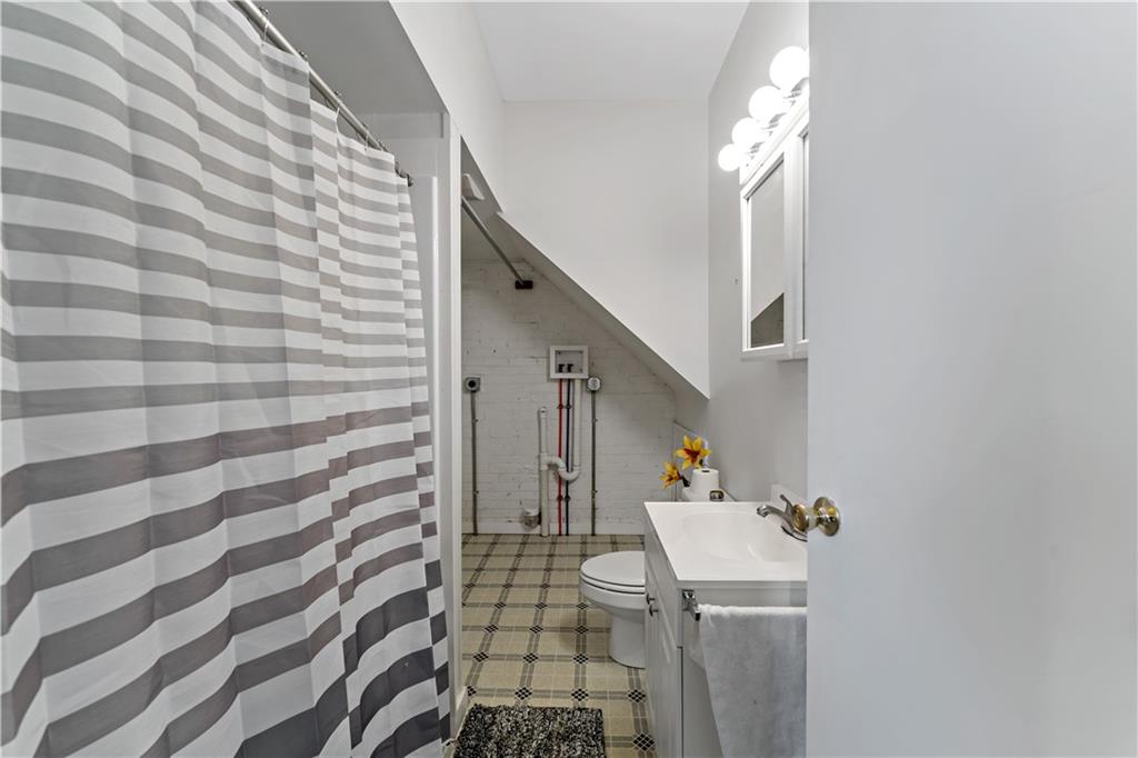131 Beam Way Pittsburgh, PA 15211 - Photo 13 of 50 a bathroom with a sink toilet and shower