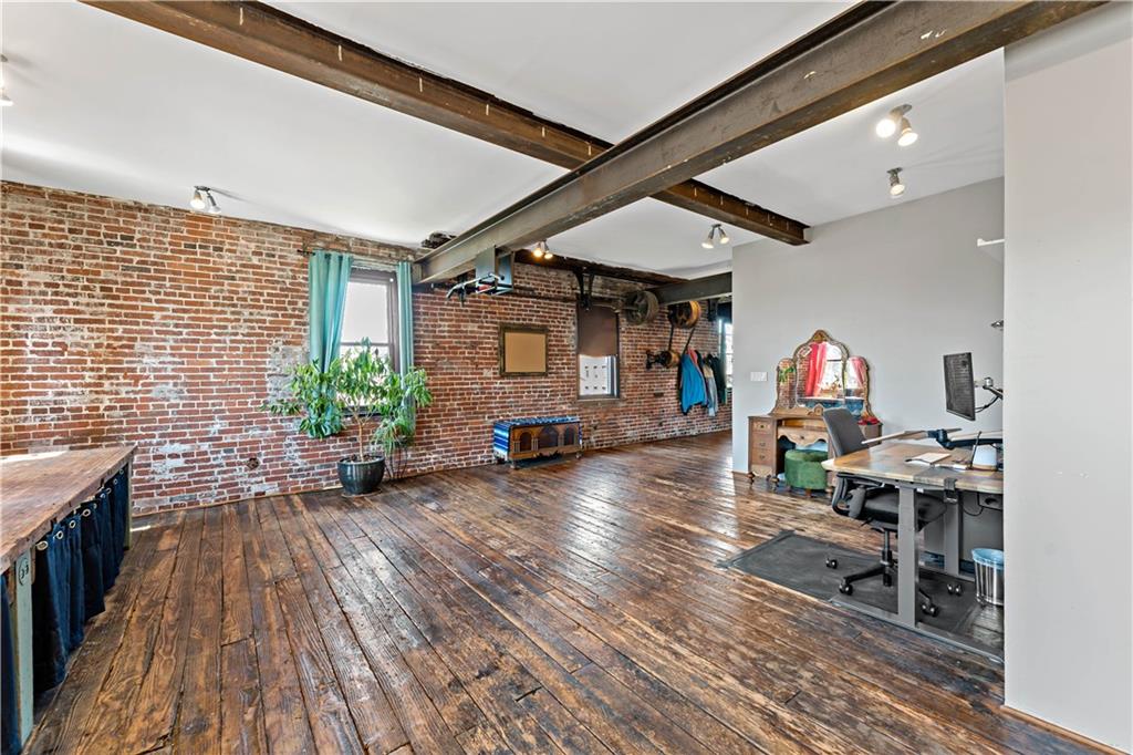 131 Beam Way Pittsburgh, PA 15211 - Photo 23 of 50 a view of a livingroom with furniture hardwood floor and a ceiling fan