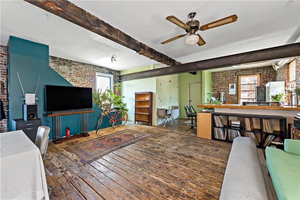 131 Beam Way Pittsburgh, PA 15211 - Photo 28 of 50 a bedroom with a bed and a flat screen tv
