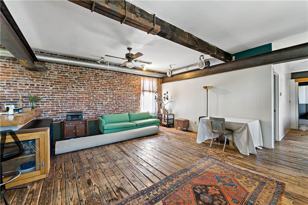 131 Beam Way Pittsburgh, PA 15211 - Photo 29 of 50 a view of a patio with table and chairs with wooden floor and fence
