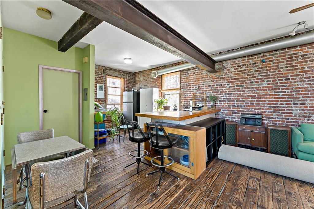 131 Beam Way Pittsburgh, PA 15211 - Photo 30 of 50 a kitchen with a stove and chairs