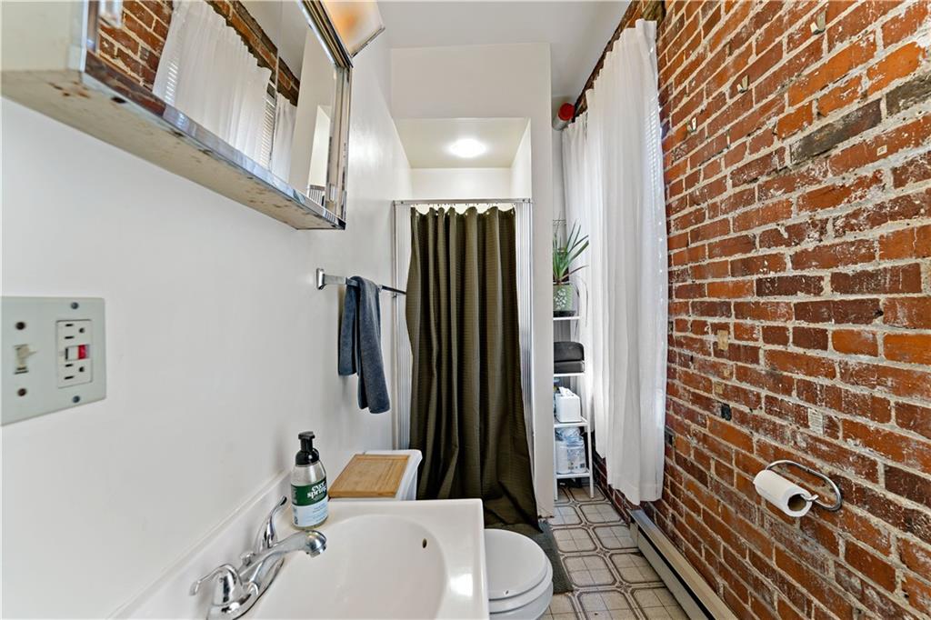131 Beam Way Pittsburgh, PA 15211 - Photo 34 of 50 a bathroom with a sink toilet and shower