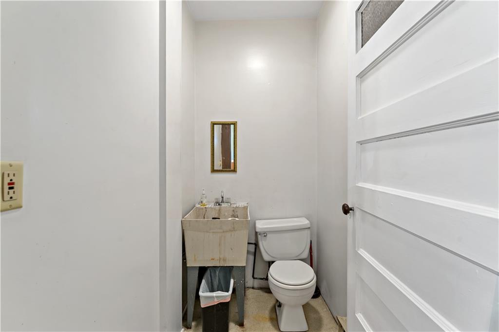 131 Beam Way Pittsburgh, PA 15211 - Photo 38 of 50 a bathroom with a toilet and a sink