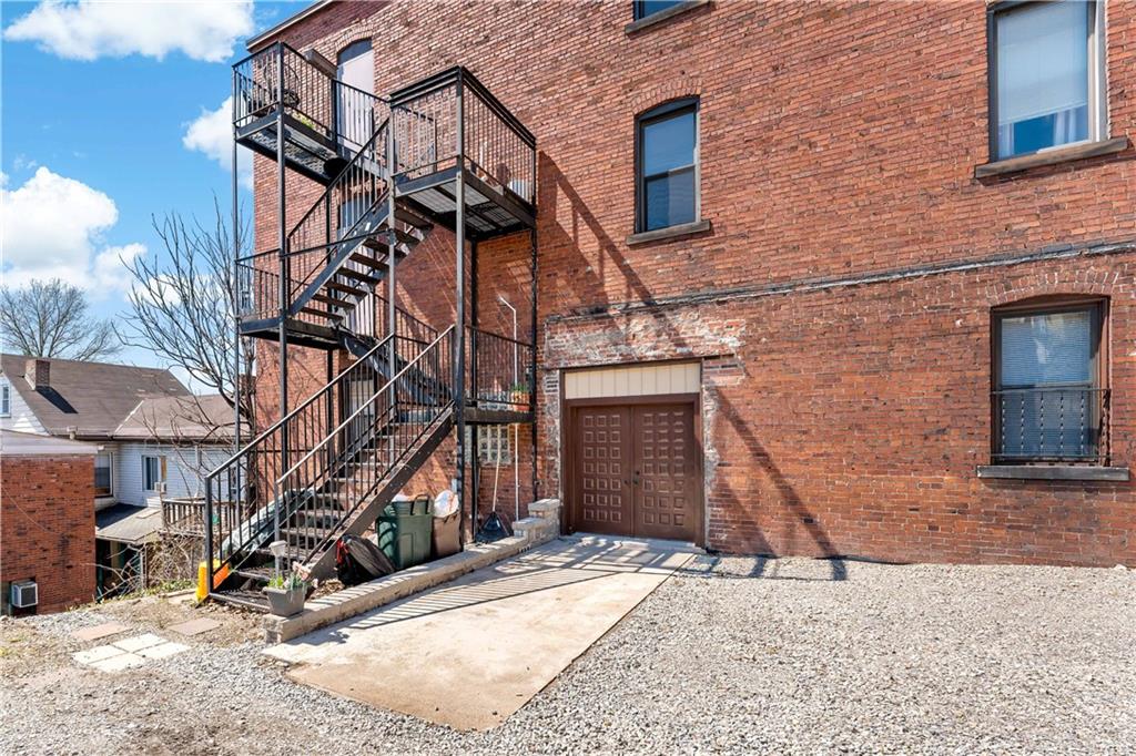 131 Beam Way Pittsburgh, PA 15211 - Photo 44 of 50 a building with a tree in front of it