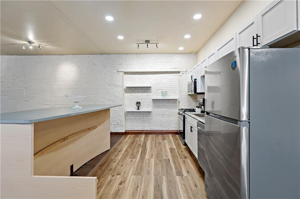 131 Beam Way Pittsburgh, PA 15211 - Photo 8 of 50 a kitchen with a refrigerator and a sink