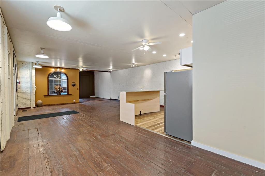 131 Beam Way Pittsburgh, PA 15211 - Photo 9 of 50 an empty room with wooden floor and windows