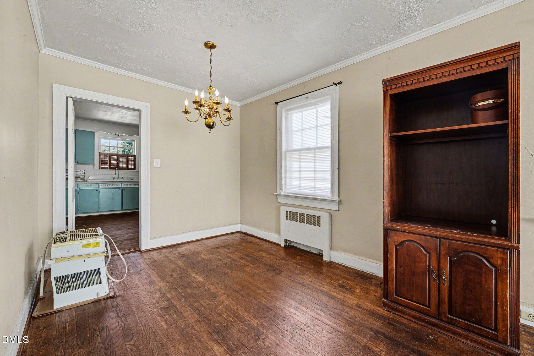300 Frances Place Kinston, NC 28501 - Photo 11 of 25 a living room with furniture and a flat screen tv