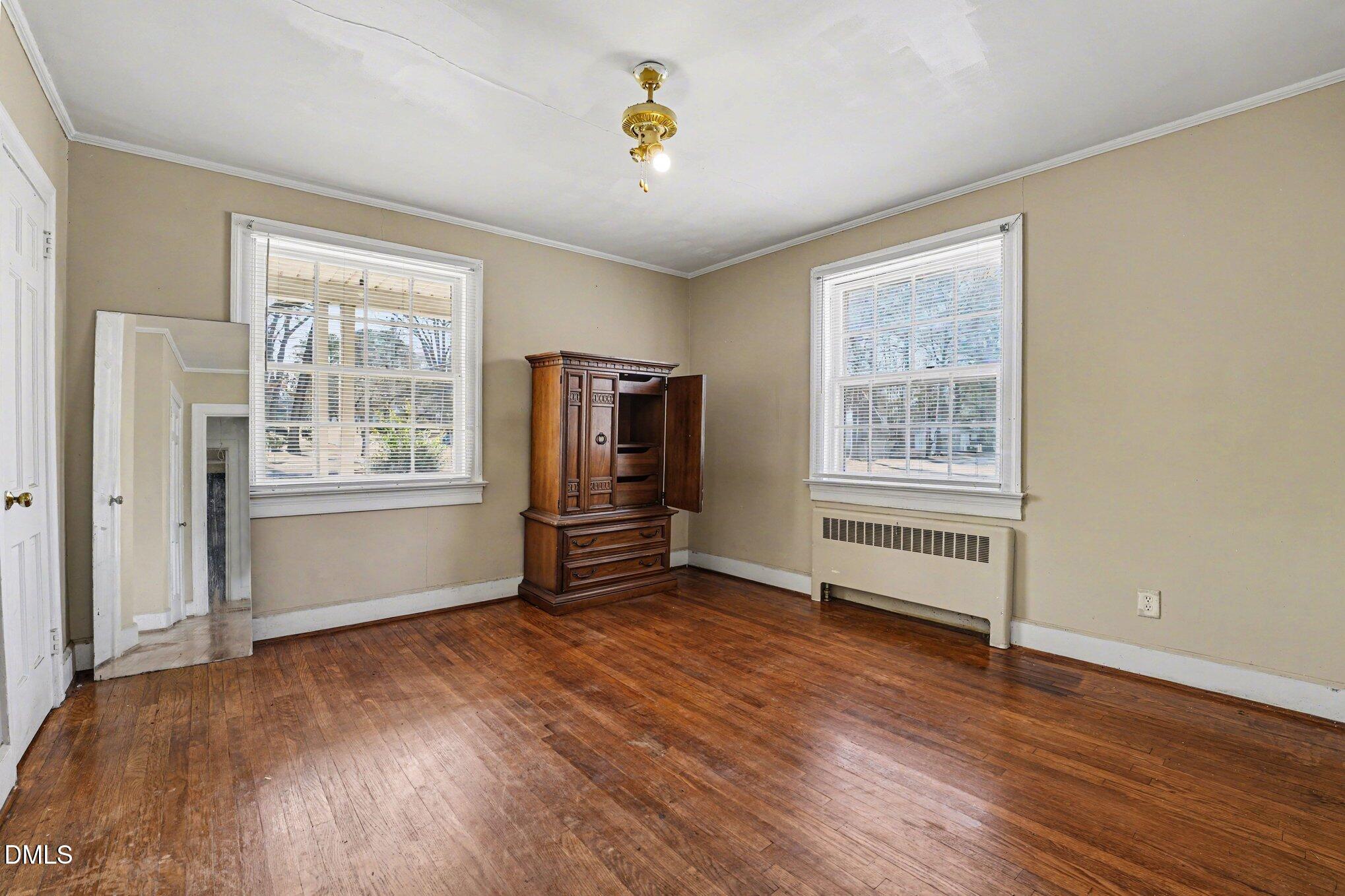 300 Frances Place Kinston, NC 28501 - Photo 20 of 25 a view of an empty room with a window and wooden floor