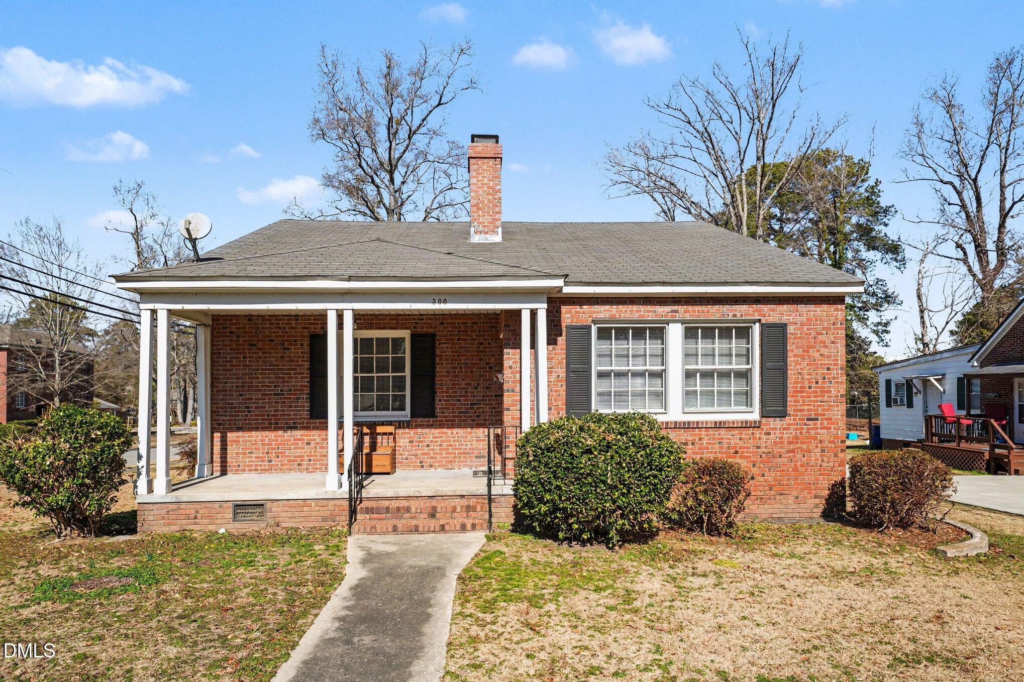 300 Frances Place Kinston, NC 28501 - Photo 2 of 25 a front view of a house with a yard