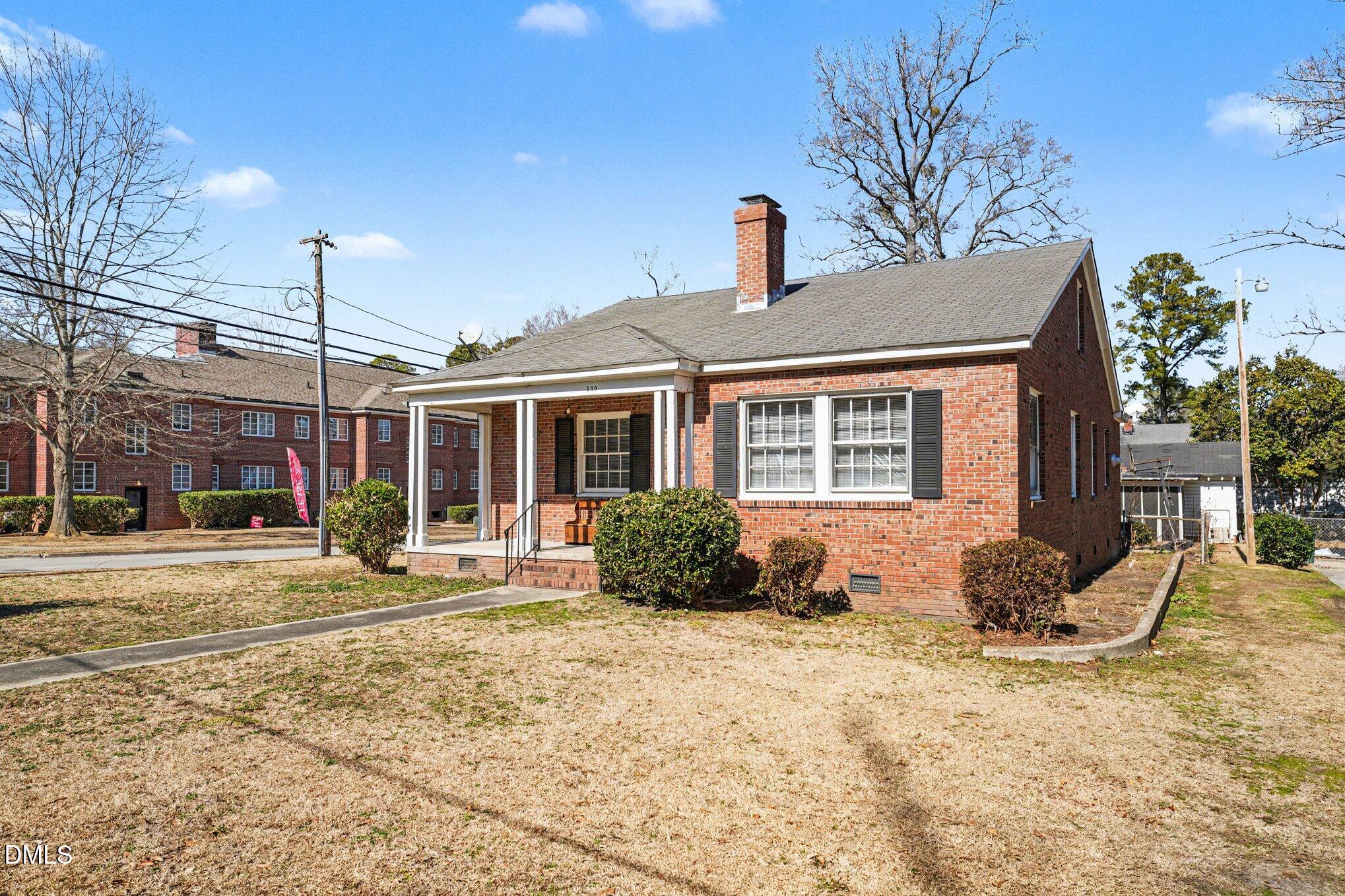 300 Frances Place Kinston, NC 28501 - Photo 3 of 25 a front view of a house with a outdoor space