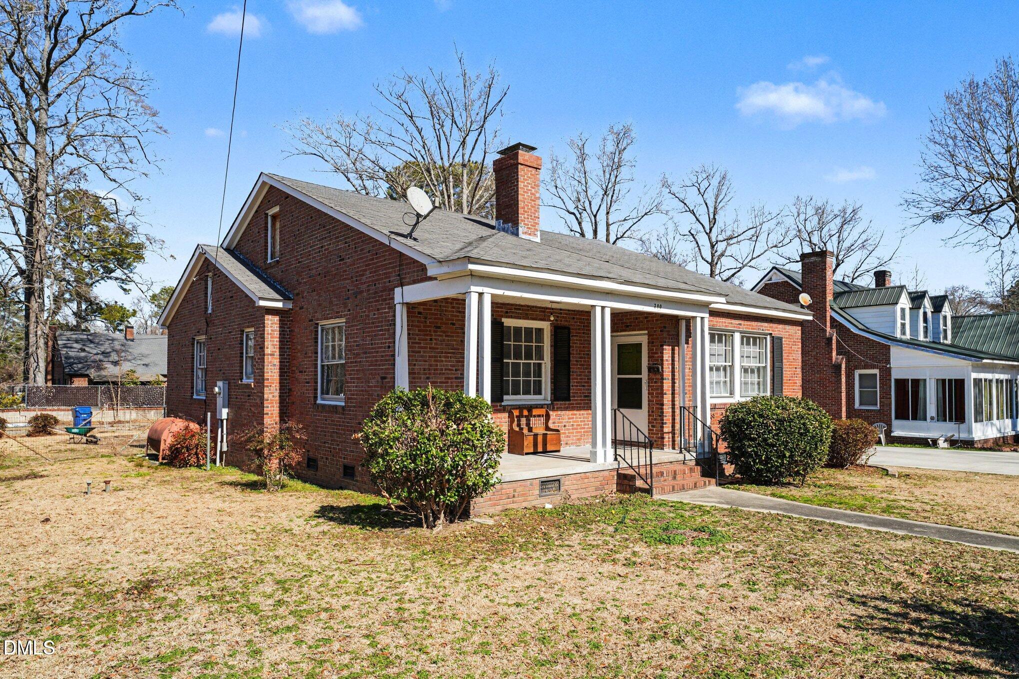 300 Frances Place Kinston, NC 28501 - Photo 4 of 25 a front view of a house with a yard