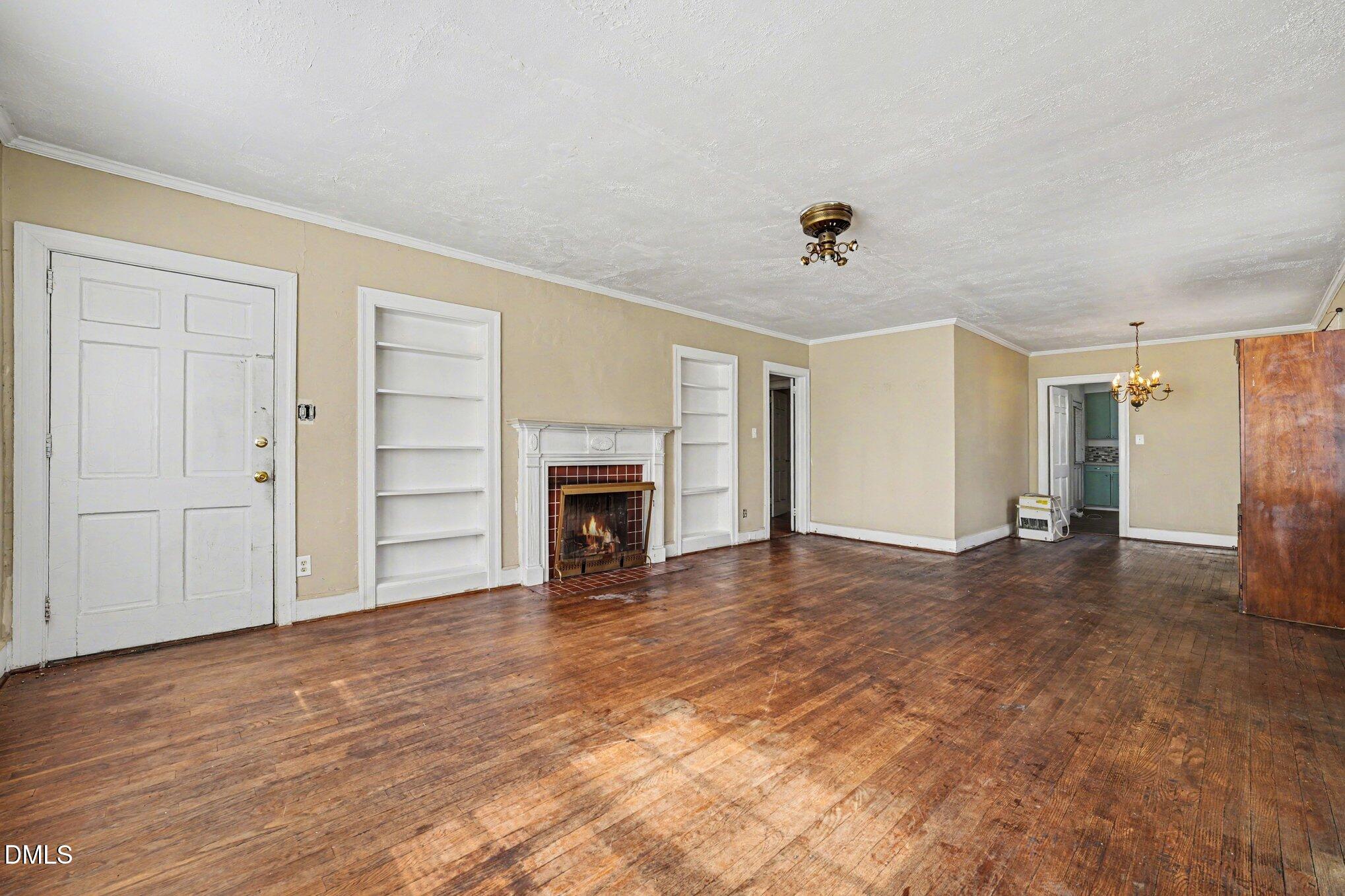 300 Frances Place Kinston, NC 28501 - Photo 7 of 25 a view of empty room with wooden floor and fan