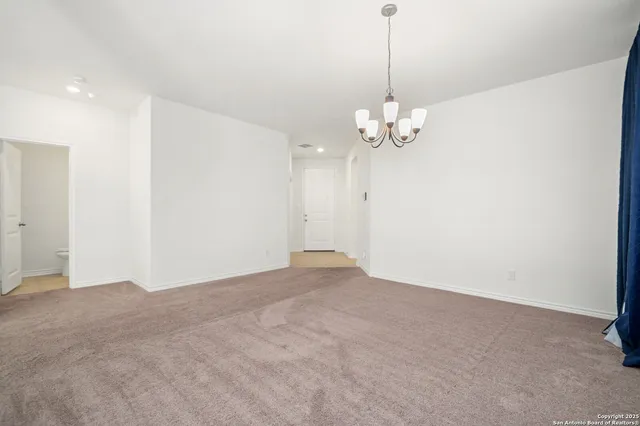 a view of a chandelier in a room