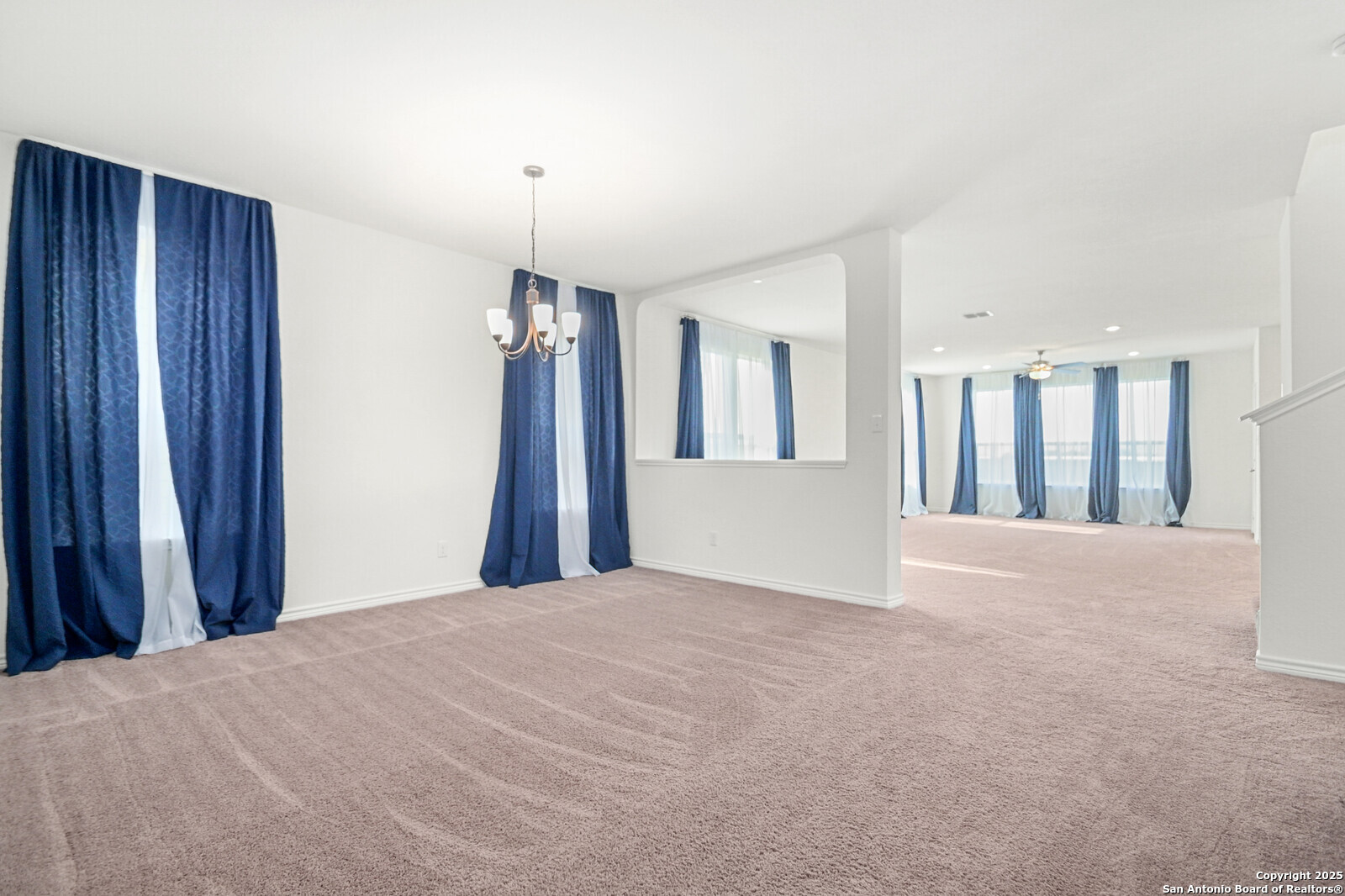 5010 Big Oak Run Elmendorf, TX 78112 - Photo 5 of 31 a view of a big room with windows and cabinet