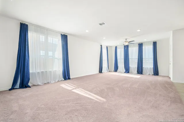 a view of a livingroom with a staircase