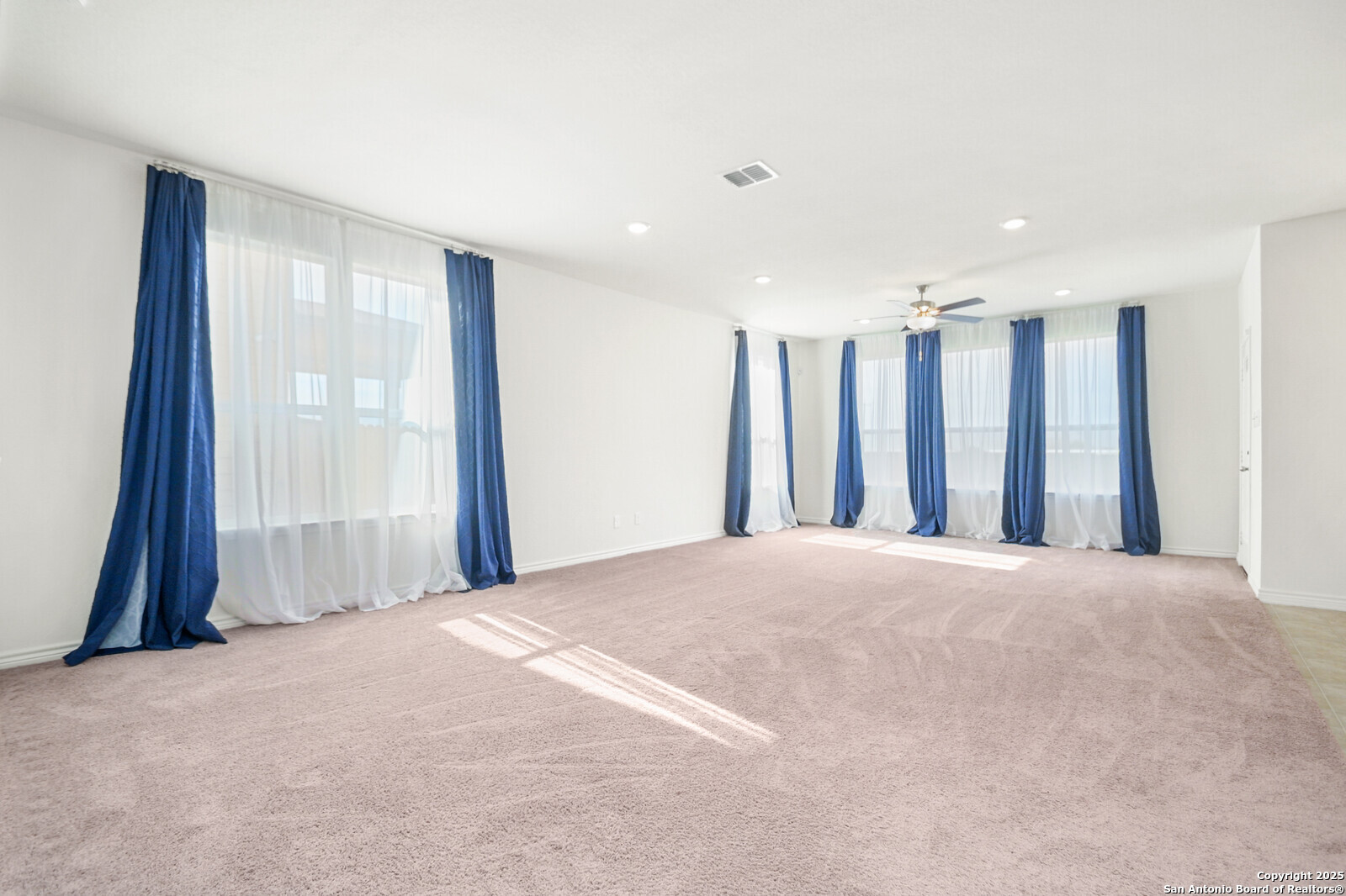 5010 Big Oak Run Elmendorf, TX 78112 - Photo 8 of 31 a view of a livingroom with a staircase