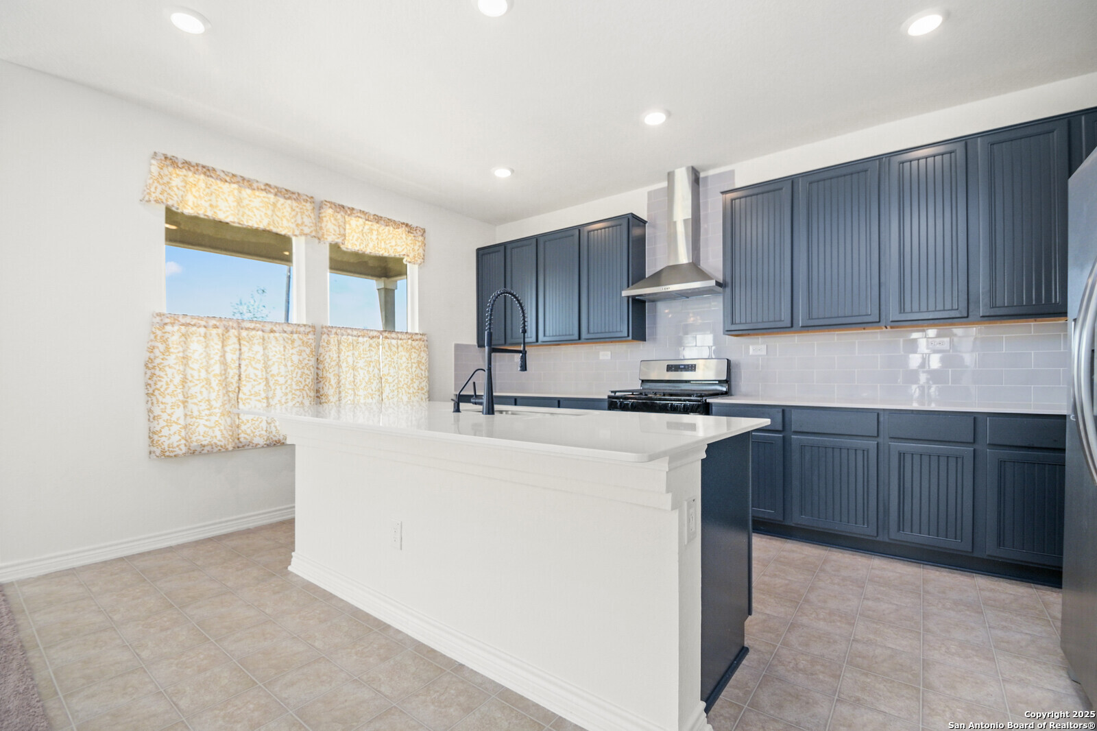 5010 Big Oak Run Elmendorf, TX 78112 - Photo 9 of 31 a kitchen with a cabinets and window
