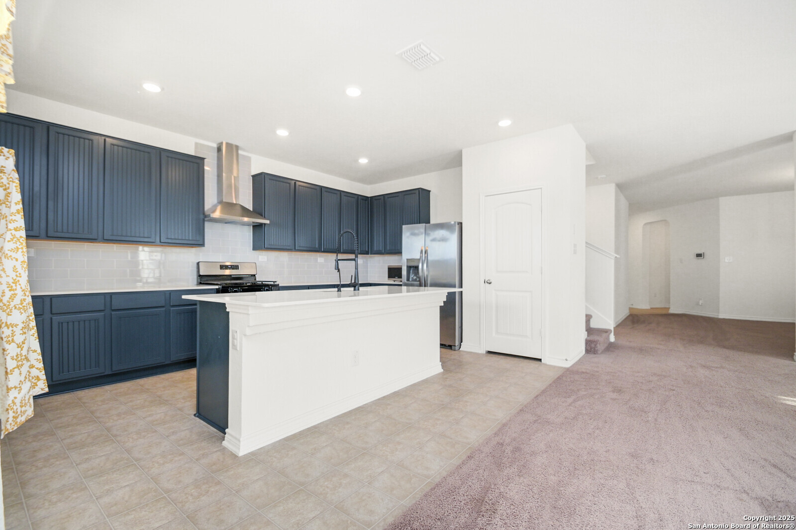 5010 Big Oak Run Elmendorf, TX 78112 - Photo 10 of 31 a kitchen with refrigerator cabinets and a sink